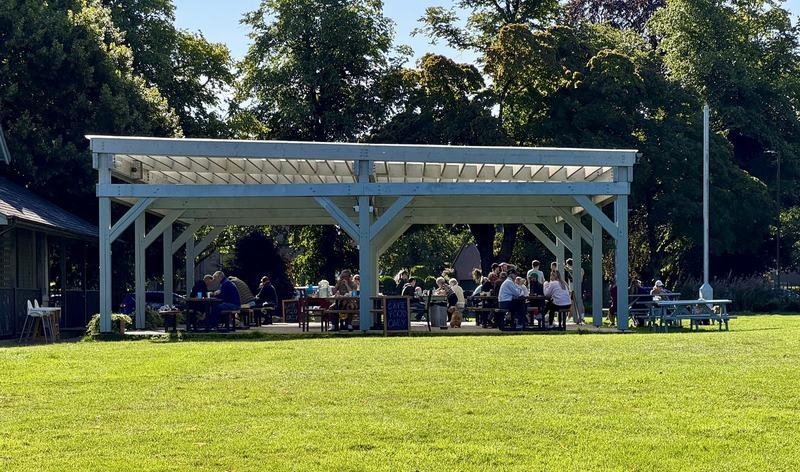 The Pavilion's covered outdoor seating in use, August 2026